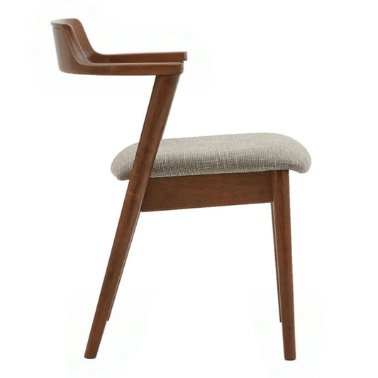 Side profile of the Tino Fabric Dining Chair showcasing its slim frame and gentle back curve.